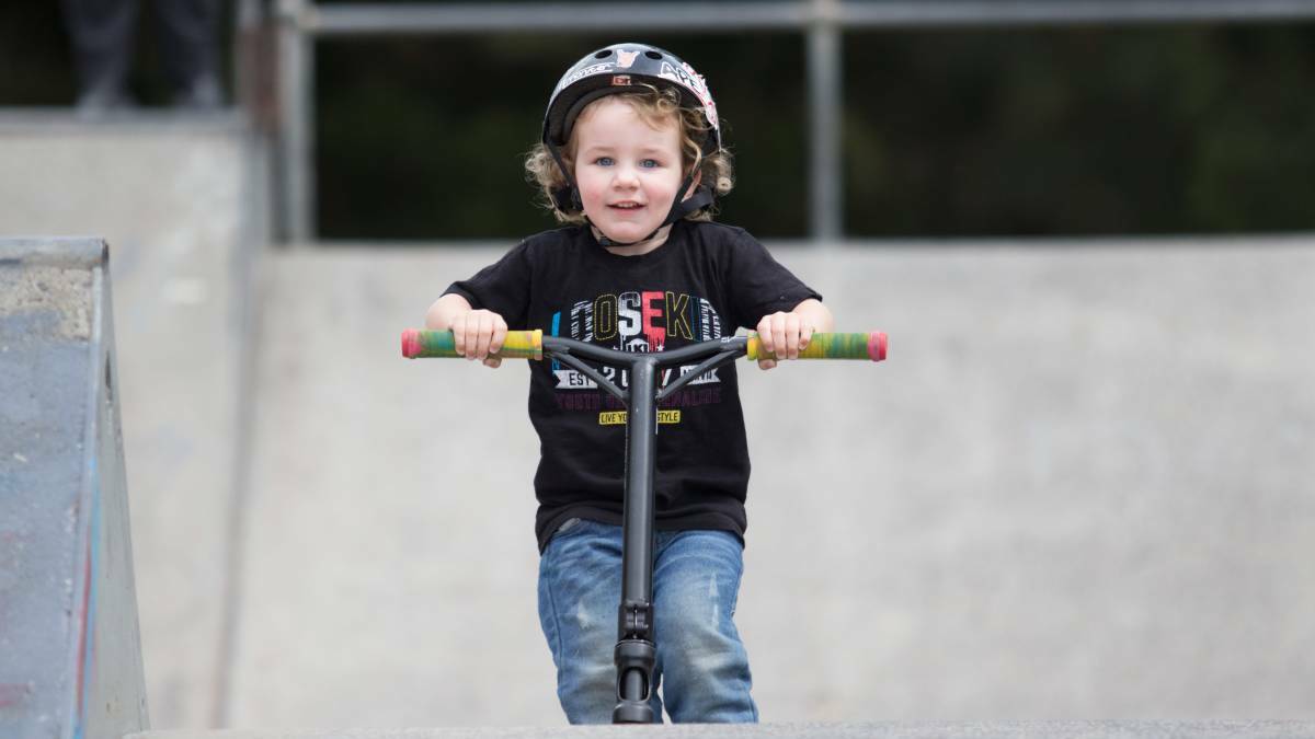 THRILL SEEKER: Two-year-old Lachlan Whiteley is a regualr at Clarendon Skate Park, where he rides his scooter most days of the week. Picture: Geoff Jones