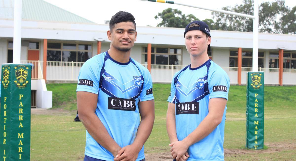 Blue bloods: Hills Sports High students and Parramatta Eels players Oregon Kaufusi and Kyle Schneider will line up for the NSW Blues in the under-18s State of Origin side. Picture: Andrew McMurtry