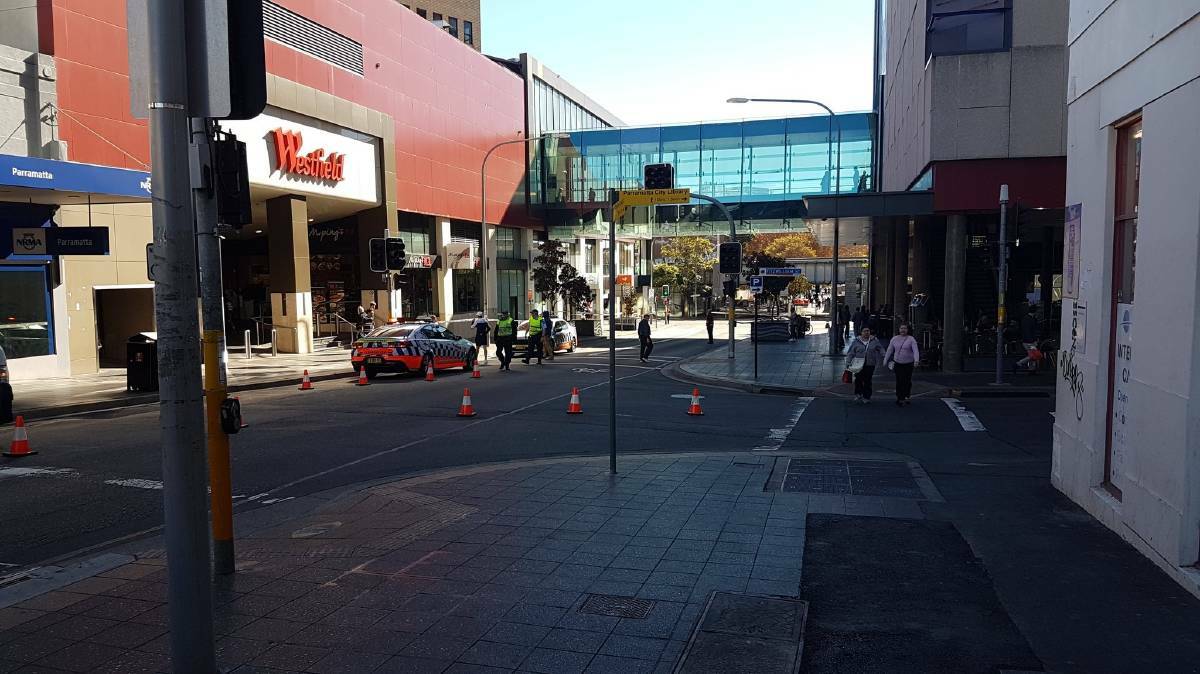 OPERATION: Police outside Westfield Parramatta on Monday morning. Photo: Twitter: Ben Giles