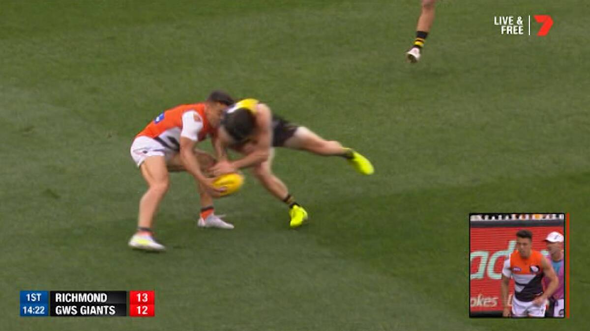 A still of the clash between Richmond captain Trent Cotchin and GWS midfielder Dylan Shiel.