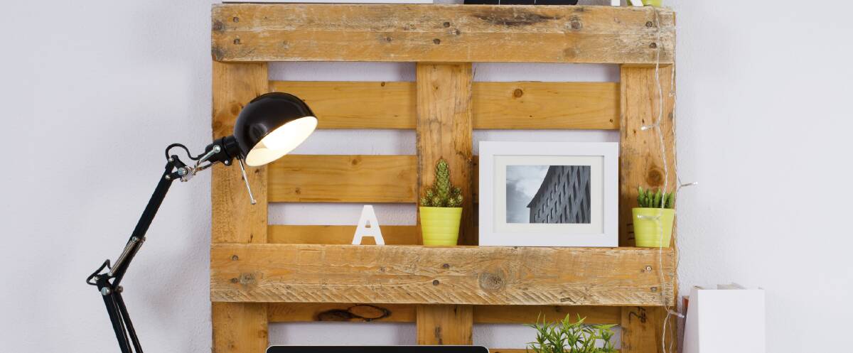 Get creative: Upcycle some furniture or materials to create a new item for your space. This pallet is a great wall hanging or desk backing. Perfect for some make shift shelving or as a stand alone decor piece for some rustic flair.