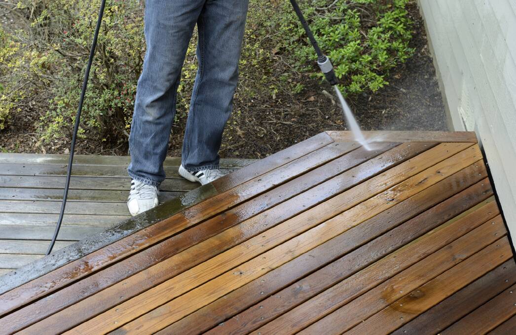 Man Power Washing Deck spring clean, recycle, recycling, clean, cleaning