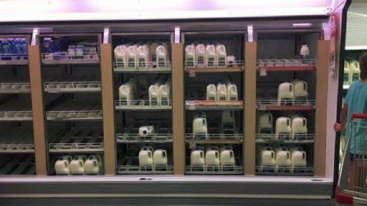 A photo showing brand label milk running low at Coles.   Photo: Facebook