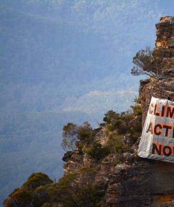 One sister's opinion: a banner hung by climate activists in the Blue Mountains on Sunday. Photo: Ireni Clarke