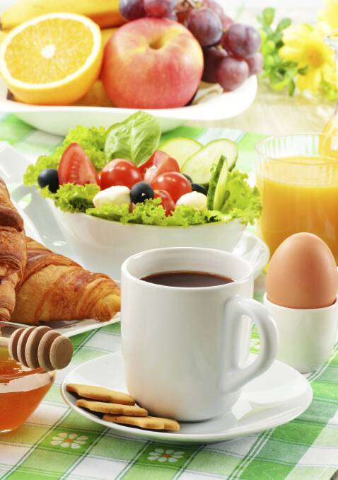 Breakfast including coffee, orange juice and vegetables groceries, food