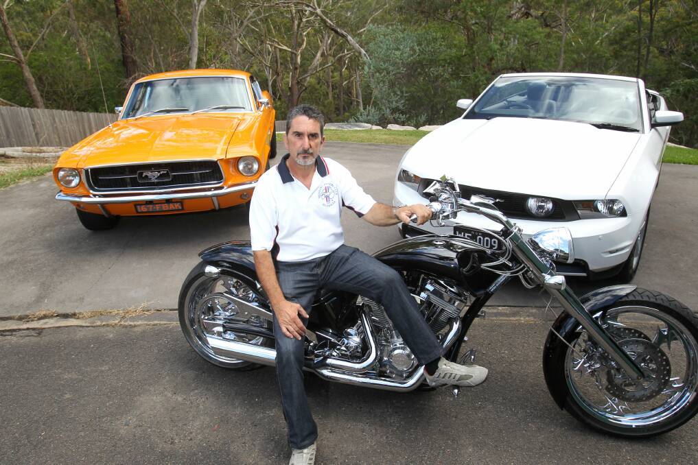 Muscle show: Wayne Feneck pictured last year with his 1967 Ford Mustang Fastback, 2010 Mustang GT convertible (which he has since sold) and Harley-Davidson. Picture: Gene Ramirez