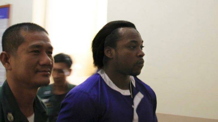 Nigerian Precious Chineme Nwoko, right, at the Cambodian Appeals Court on Tuesday after being refused permission to appeal against his 27-year prison sentence for heroin smuggling. Photo: Craig Skehan 