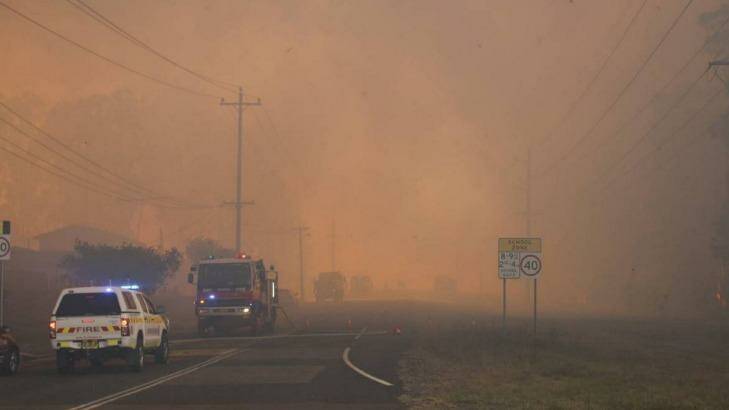 Fires are threatening properties in the Hunter region last month. Photo: Michael John Fisher