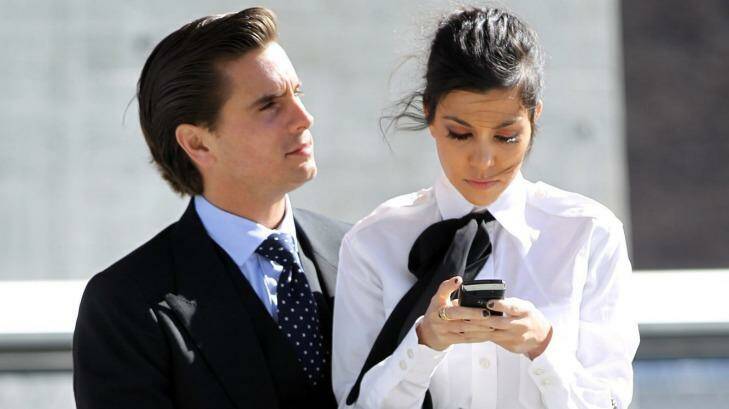 Scott Disick and Kourtney Kardashian, a modern couple who relied on mobile phones until they reportedly split this week.  Photo: Christopher Peterson