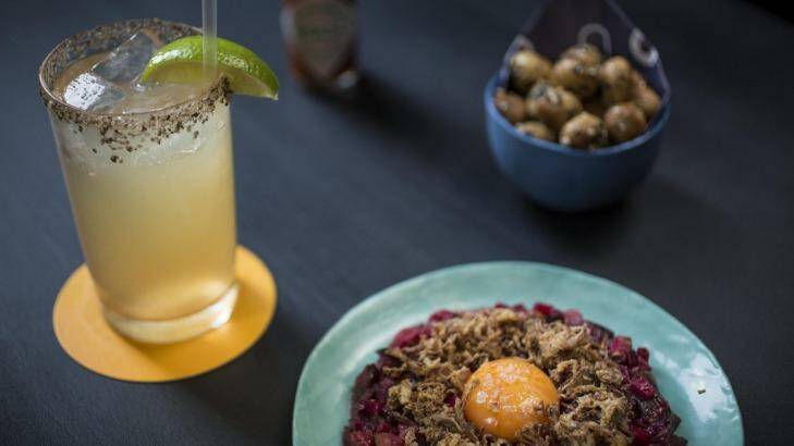 Batanga! cocktail with pickled tartare and macadamias with lemon myrtle dukkah at PS Soda. Photo: Dominic Lorrimer
