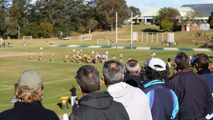 Weighing in on athletic bursaries: Parents watch as Saint Ignatius' College, Riverview, plays Scots College. Photo: Cole Bennetts