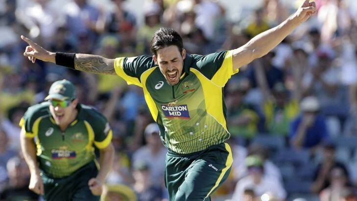 First scalp: Mitchell Johnson celebrates the dismisal of England opener Moeen Ali with an unplayable ball. Photo: Hamish Blair