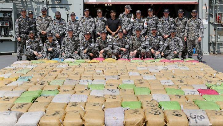 SAME OLD: HMAS Toowoomba's boarding parties with 5.6 tonnes of cannabis resin they intercepted. On July 1, they lost their tax-free status even though their mission remains unchanged. Photo: Defence Department