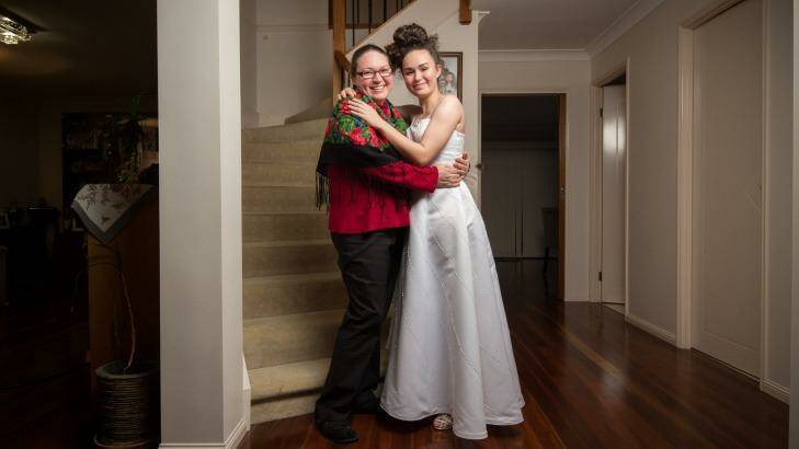 Maya Cole tries on her dress with her mother Elena Cole ahead of the White Debutante Ball. Photo: Wolter Peeters
