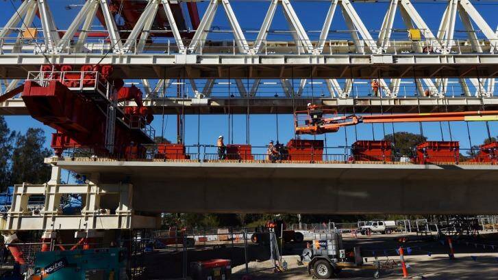 A Skytrain span being assembled by one of two massive movable gantries. Photo: Nick Moir 