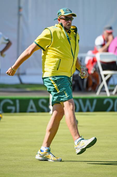 Matthew Flapper in a first day match in the men's triples. Photo: Getty Images