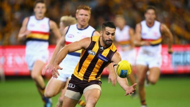 Cometh the hour, cometh the man... Paul Puopolo was Hawthorn's hero on the night. Photo: Getty Images