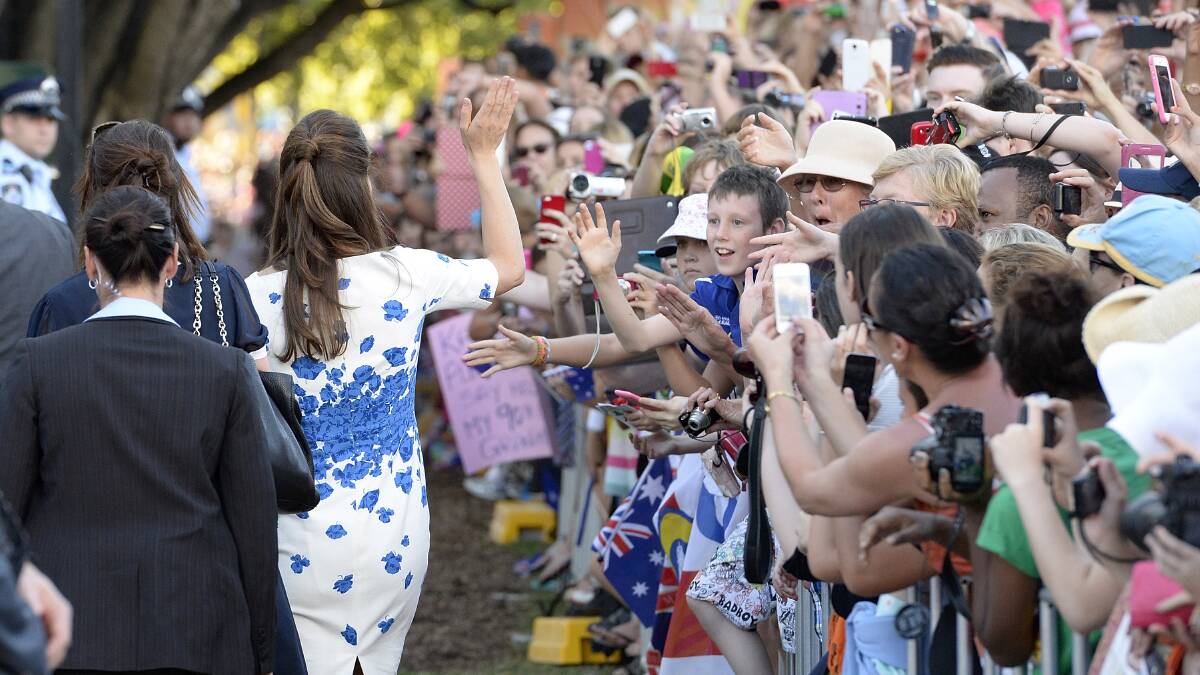  Catherine, Duchess of Cambridge waves goodbye to the crowd at Southbank on April 19, 2014 in Brisbane, Australia. The Duke and Duchess of Cambridge are on a three-week tour of Australia and New Zealand, the first official trip overseas with their son, Prince George of Cambridge. Photo: Bradley Kanaris/Getty Images.
