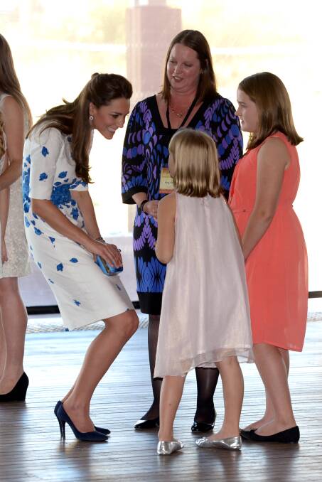 Catherine, Duchess of Cambridge meets bereaved families as the Duke and Duchess of Cambridge visit RAAF base Amberley on April 19, 2014 in Brisbane, Australia. The Duke and Duchess of Cambridge are on a three-week tour of Australia and New Zealand, the first official trip overseas with their son, Prince George of Cambridge. Photo: Anthony Devlin - Pool/Getty Images.