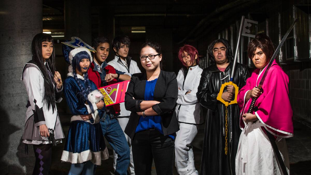Smash!: Organiser Susan Ma poses with "characters" for the upcoming Smash! Anime Convention. Pictures: Geoff Jones.
