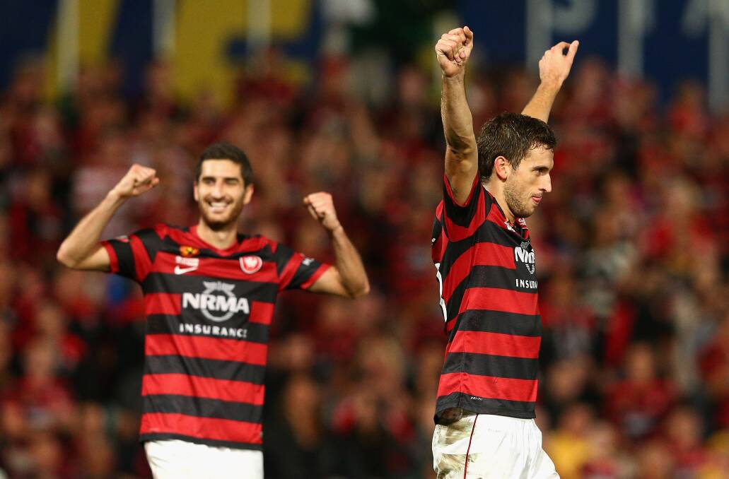 SYDNEY, AUSTRALIA - APRIL 26: Iacopo La Rocca and Matthew Spiranovic of the Wanderers celebrate winning the A-League Semi Final match between the Western Sydney Wanderers and the Central Coast Mariners at Pirtek Stadium on April 26, 2014 in Sydney, Australia. (Photo by Cameron Spencer/Getty Images)