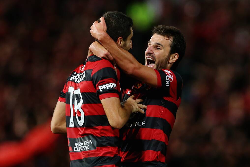 SYDNEY, AUSTRALIA - APRIL 26: Iacopo La Rocca of the Wanderers celebrates with Labinot Haliti of the Wanderers after scoring a goal during the A-League Semi Final match between the Western Sydney Wanderers and the Central Coast Mariners at Pirtek Stadium on April 26, 2014 in Sydney, Australia. (Photo by Mark Kolbe/Getty Images)