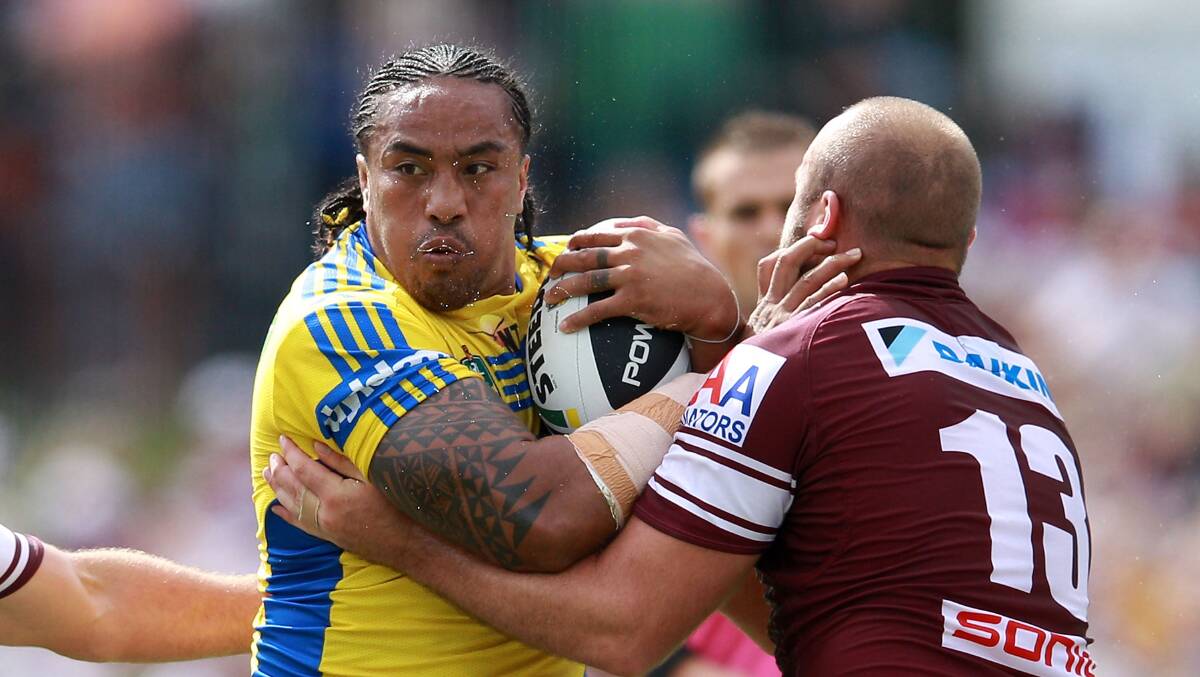 SYDNEY, AUSTRALIA - MARCH 23: Fuifui Moimoi of the Eels is tackled during the round three NRL match between the Manly-Warringah Sea Eagles and the Parramatta Eels at Brookvale Oval on March 23, 2014 in Sydney, Australia. (Photo by Matt Blyth/Getty Images)