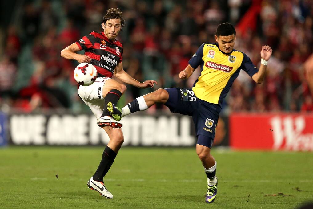 SYDNEY, AUSTRALIA - APRIL 26: Mateo Poljak of the Wanderers contests the ball against Kim Seung-Yong of the Mariners during the A-League Semi Final match between the Western Sydney Wanderers and the Central Coast Mariners at Pirtek Stadium on April 26, 2014 in Sydney, Australia. (Photo by Ashley Feder/Getty Images)
