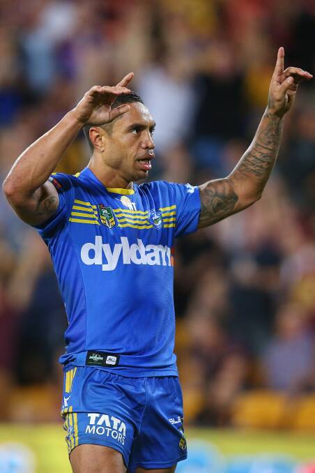 BRISBANE, AUSTRALIA - APRIL 04: Willie Tonga of the Eels celebrates after scoring a breakaway try during the round five NRL match between the Brisbane Broncos and Parramatta Eels at Suncorp Stadium on April 4, 2014 in Brisbane, Australia. (Photo by Chris Hyde/Getty Images)