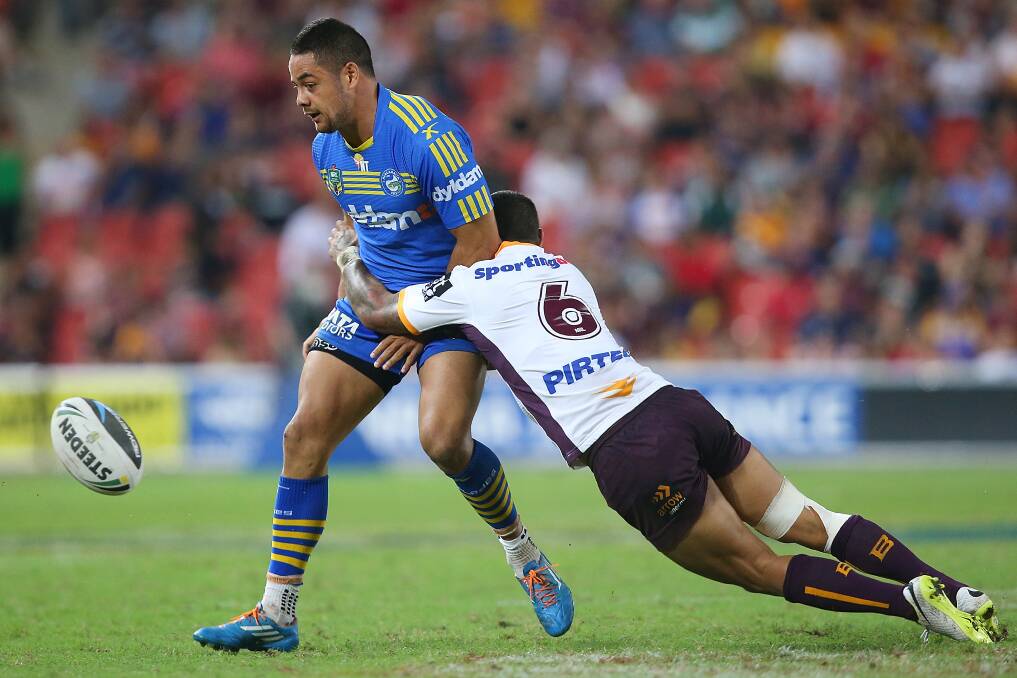 BRISBANE, AUSTRALIA - APRIL 04: Jarryd Hayne of the Eels kicks during the round five NRL match between the Brisbane Broncos and Parramatta Eels at Suncorp Stadium on April 4, 2014 in Brisbane, Australia. (Photo by Chris Hyde/Getty Images)