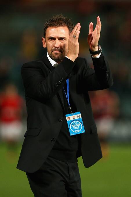 SYDNEY, AUSTRALIA - APRIL 26: Wanderers coach Tony Popovic celebrates winning the A-League Semi Final match between the Western Sydney Wanderers and the Central Coast Mariners at Pirtek Stadium on April 26, 2014 in Sydney, Australia. (Photo by Cameron Spencer/Getty Images)