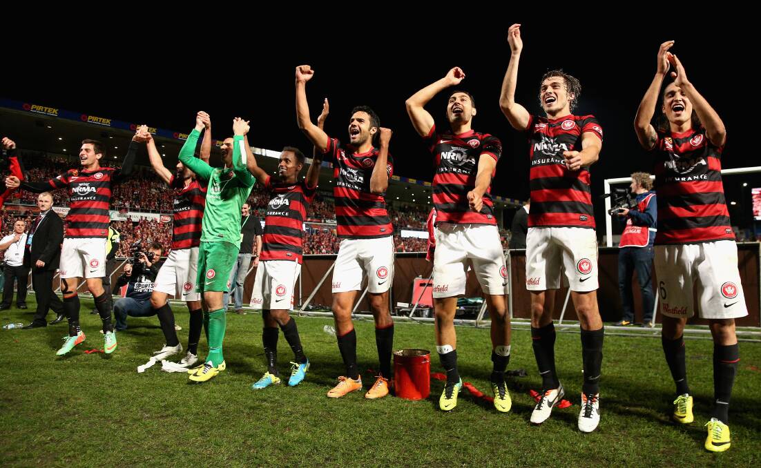 SYDNEY, AUSTRALIA - APRIL 26: Wanderers players celebrate winning the A-League Semi Final match between the Western Sydney Wanderers and the Central Coast Mariners at Pirtek Stadium on April 26, 2014 in Sydney, Australia. (Photo by Cameron Spencer/Getty Images)