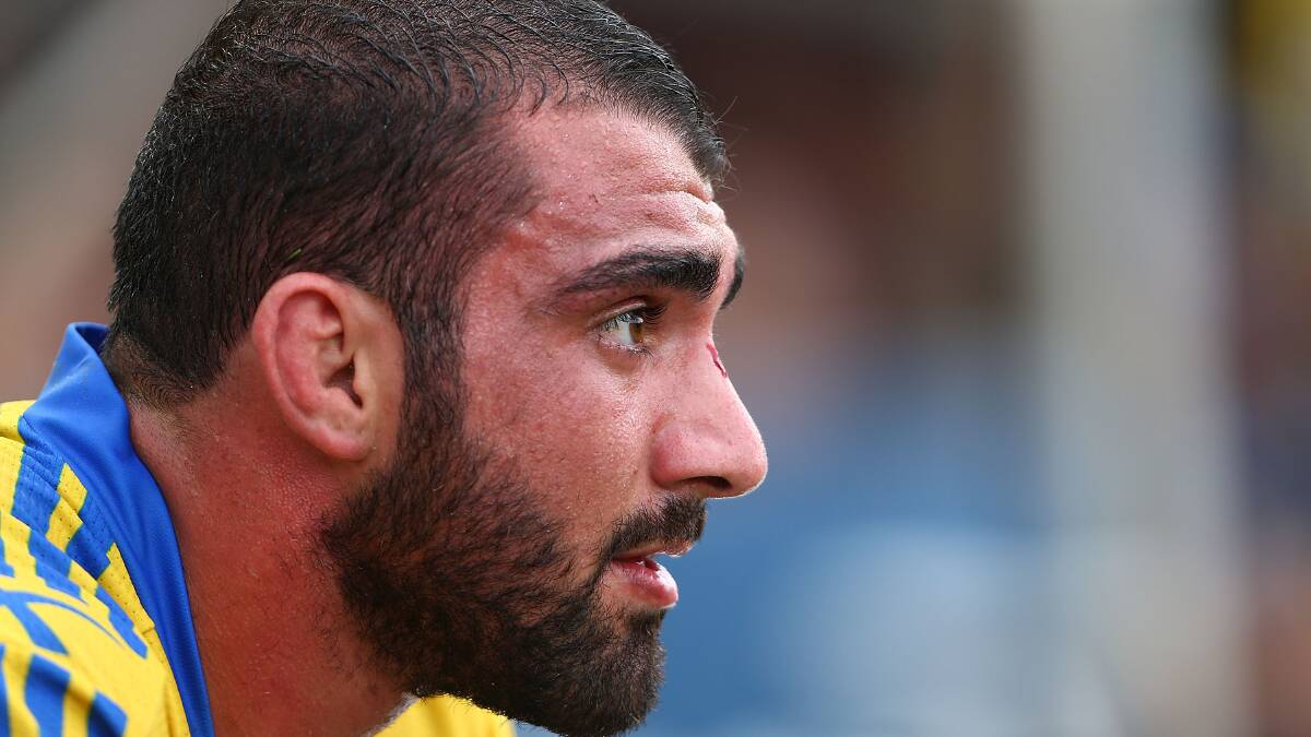 SYDNEY, AUSTRALIA - MARCH 23: Tim Mannah of the Eels takes a break during the round three NRL match between the Manly-Warringah Sea Eagles and the Parramatta Eels at Brookvale Oval on March 23, 2014 in Sydney, Australia. (Photo by Renee McKay/Getty Images)