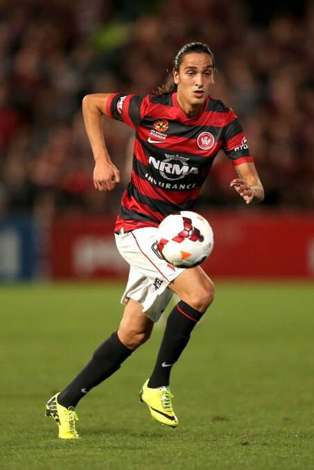 SYDNEY, AUSTRALIA - APRIL 26: Jerome Polenz of the Wanderers controls the ball during the A-League Semi Final match between the Western Sydney Wanderers and the Central Coast Mariners at Pirtek Stadium on April 26, 2014 in Sydney, Australia. (Photo by Ashley Feder/Getty Images)