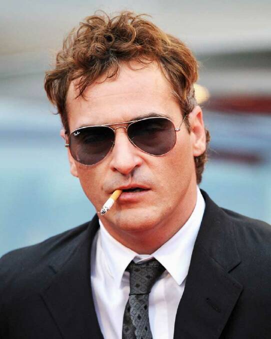 Hello, Joaquin Phoenix. The green-eyed actor hides his best assets and smoulders in his Aviators.