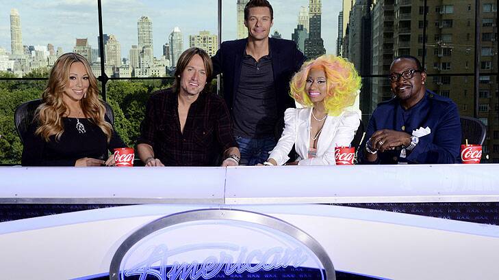 <i>American Idol</i> host Ryan Seacrest (middle) with the new-look judging panel: Mariah Carey, Keith Urban, Nicki Minaj and Randy Jackson.