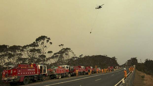 Emergency declared: An RFS team on the Bells Line of Road near Mt Victoria on Sunday. Photo: Dean Sewell 