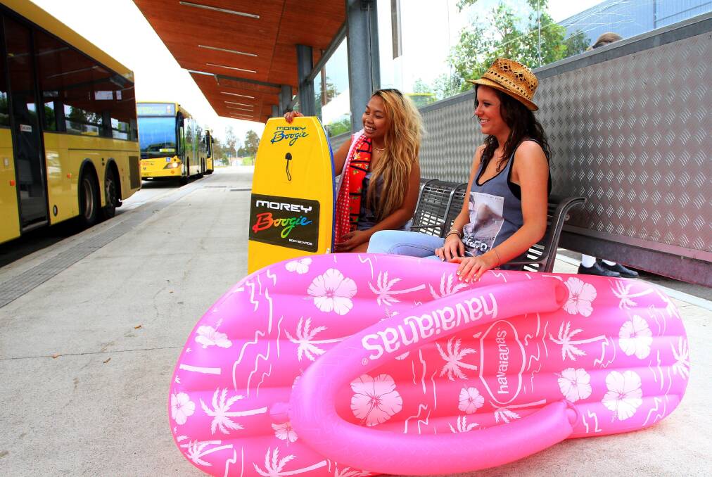 Salmia Soriano and Shakiera Bowman, Story about a bus being arranged from Rouse Hill town centre to take patrons to the beach on school holidays , Photo: Carlos Furtado